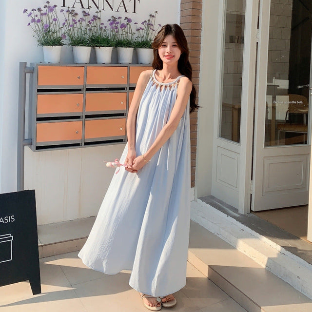 Light blue soft girl aesthetic maxi dress in natural daylight