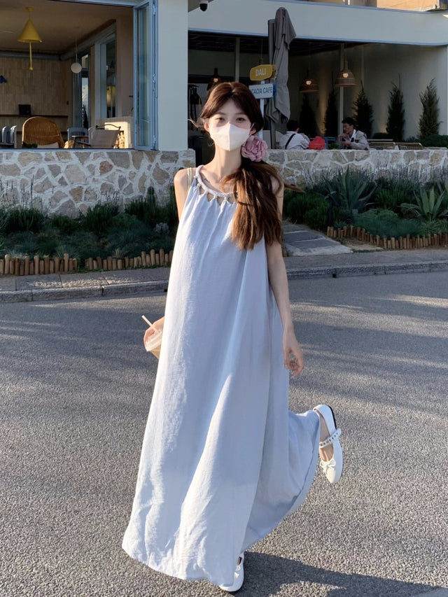 Korean-inspired sleeveless summer dress styled with white flats