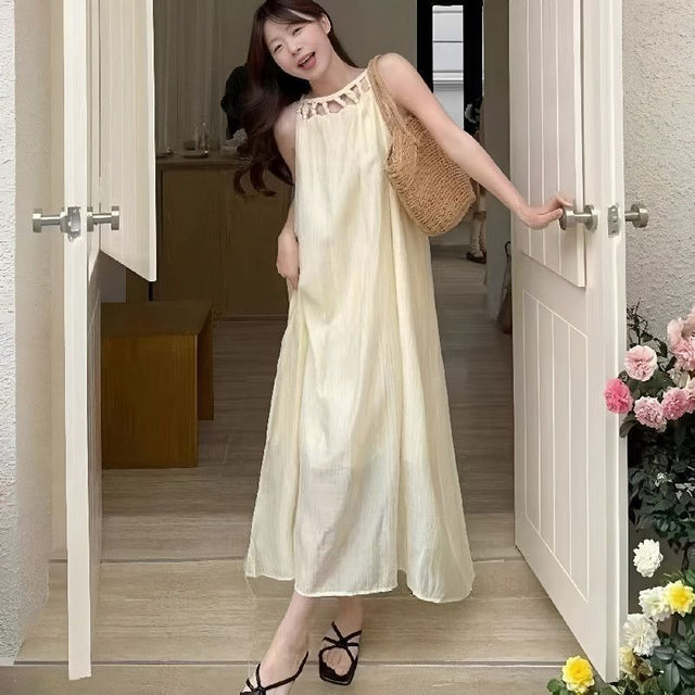 Cream halter neck flowy dress with Korean soft girl vibe

